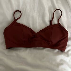 Athleta adjustable and convertible swim top with pads included and removable